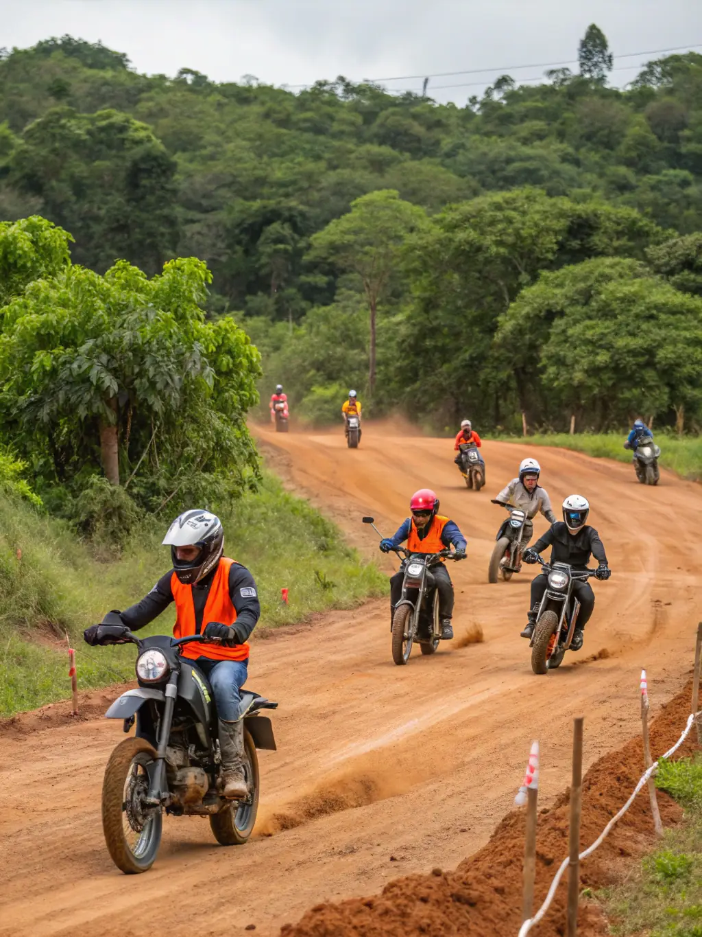 A group of beginners learning basic mountain biking skills in a controlled environment, emphasizing the introductory programs offered by TEAM BIKERS 22.